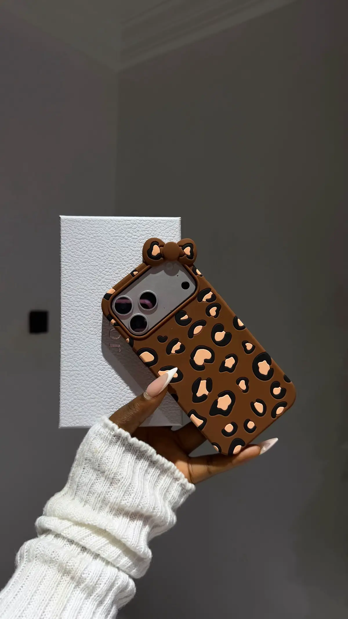 Brown leopard case with bow