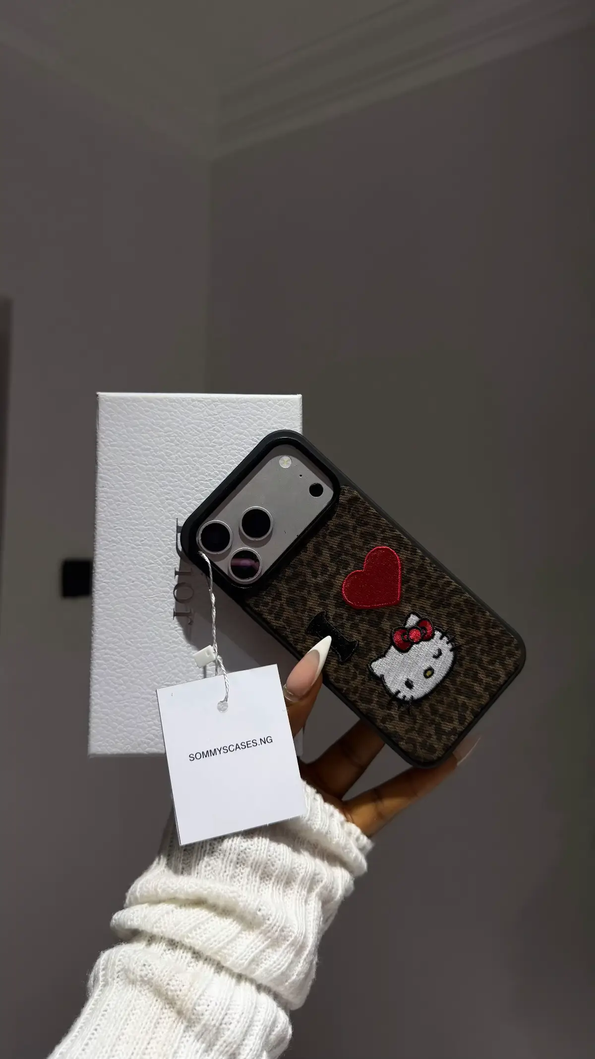 Black case with Hello Kitty