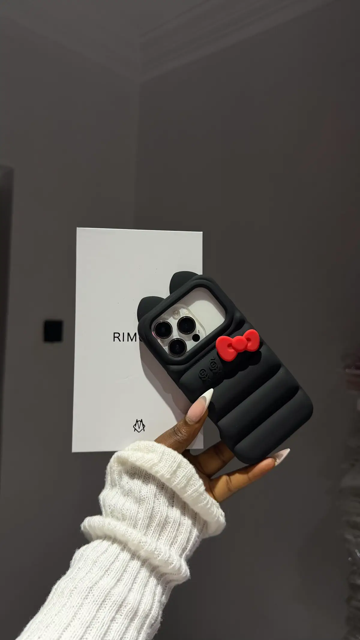 Black case with red bow
